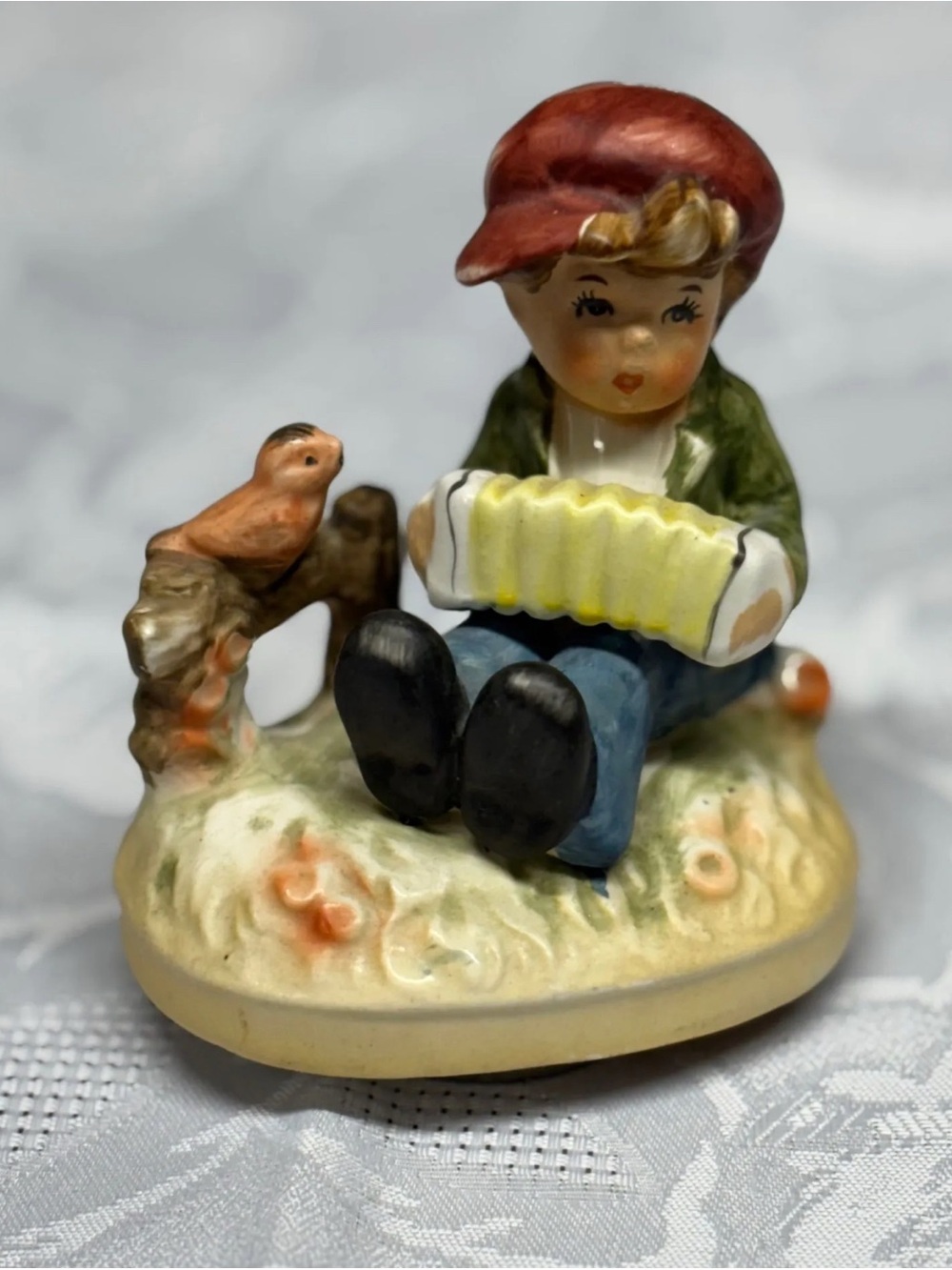 Vintage Musical Ceramic Boy Figurine Playing Accordion - Red Hat, Green Jacket